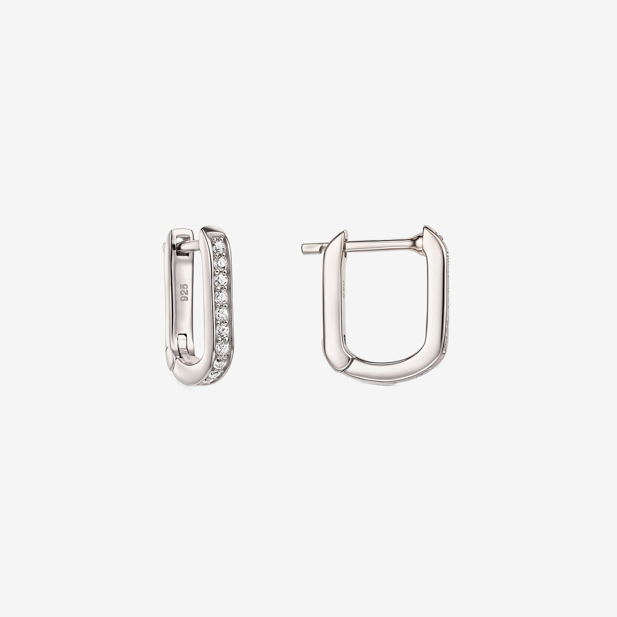 Pair of sterling silver U-shaped huggie hoop earrings with clear zirconia pavé, one shown open to display the hinged clasp, isolated on a white background.