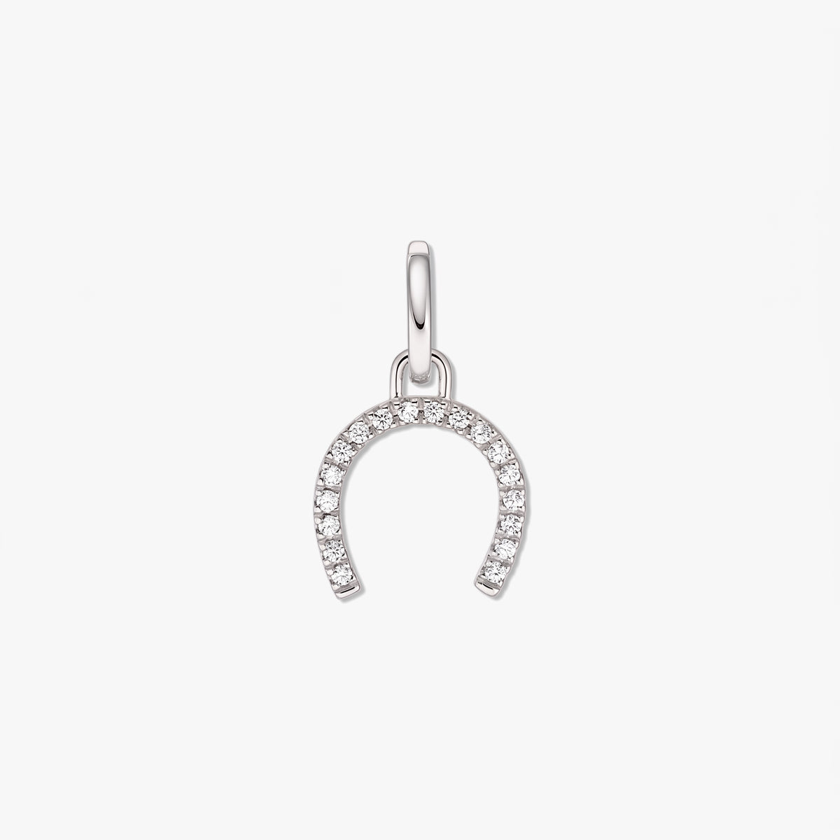 Sterling silver horseshoe pendant with clear zirconia pavé, isolated on a white background.