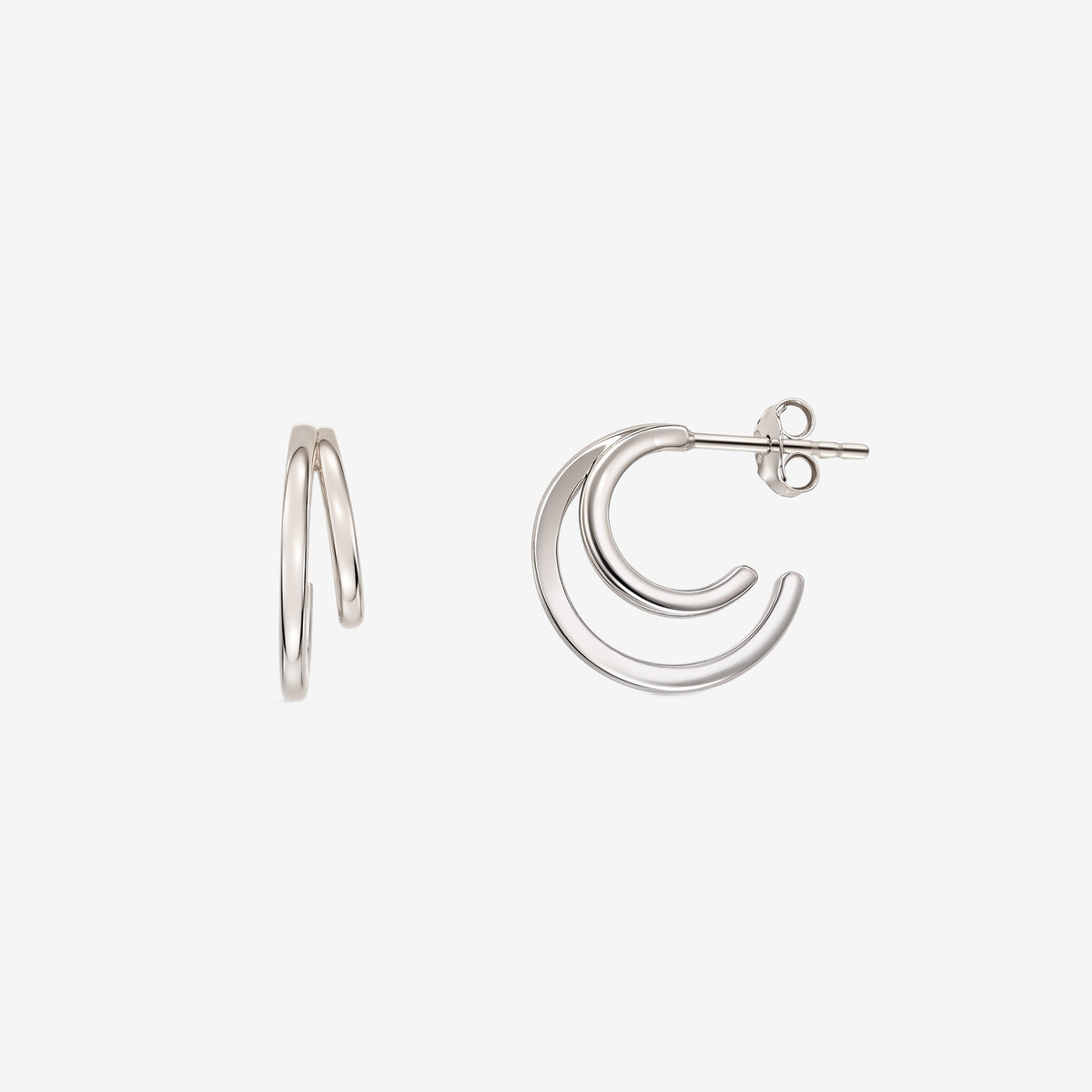 Siamese Silver Earrings by Indira — double‑hoop sterling silver stud earrings with butterfly backs on a white background.