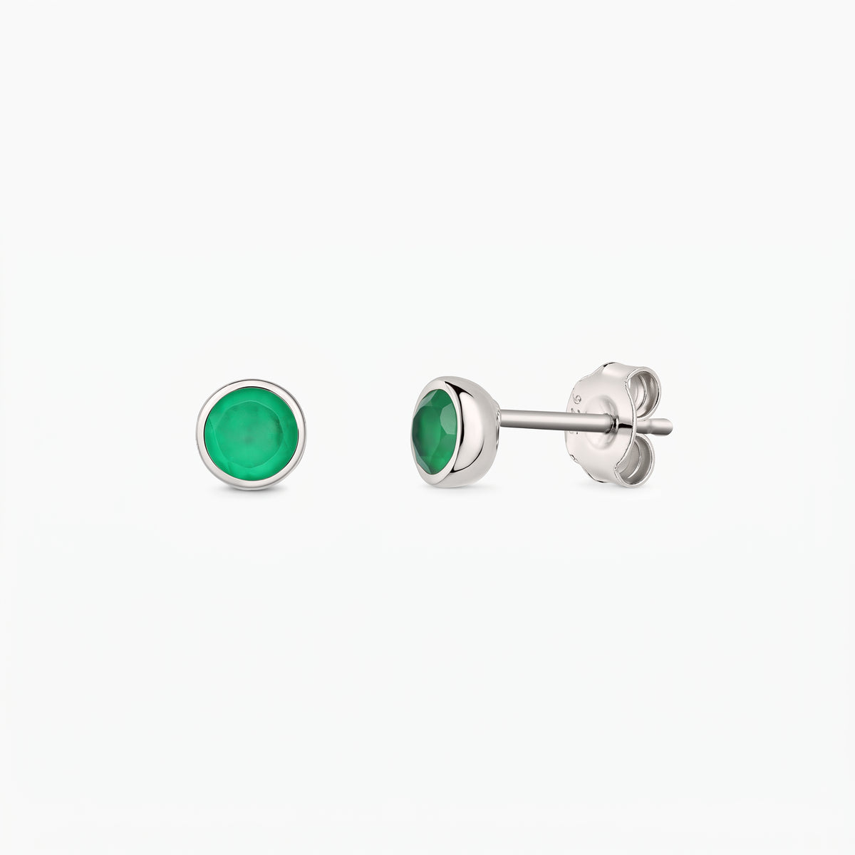 Pair of silver stud earrings with bezel‑set green onyx stones on a white background, shown front and side with butterfly backs.