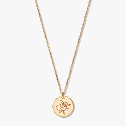 Gold‑plated silver necklace with a round medallion engraved with a rose, photographed centered on a white background.