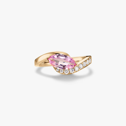 14K yellow gold ring with a marquise-cut pink sapphire and pavé natural diamonds on a wrap band, isolated on a white background.