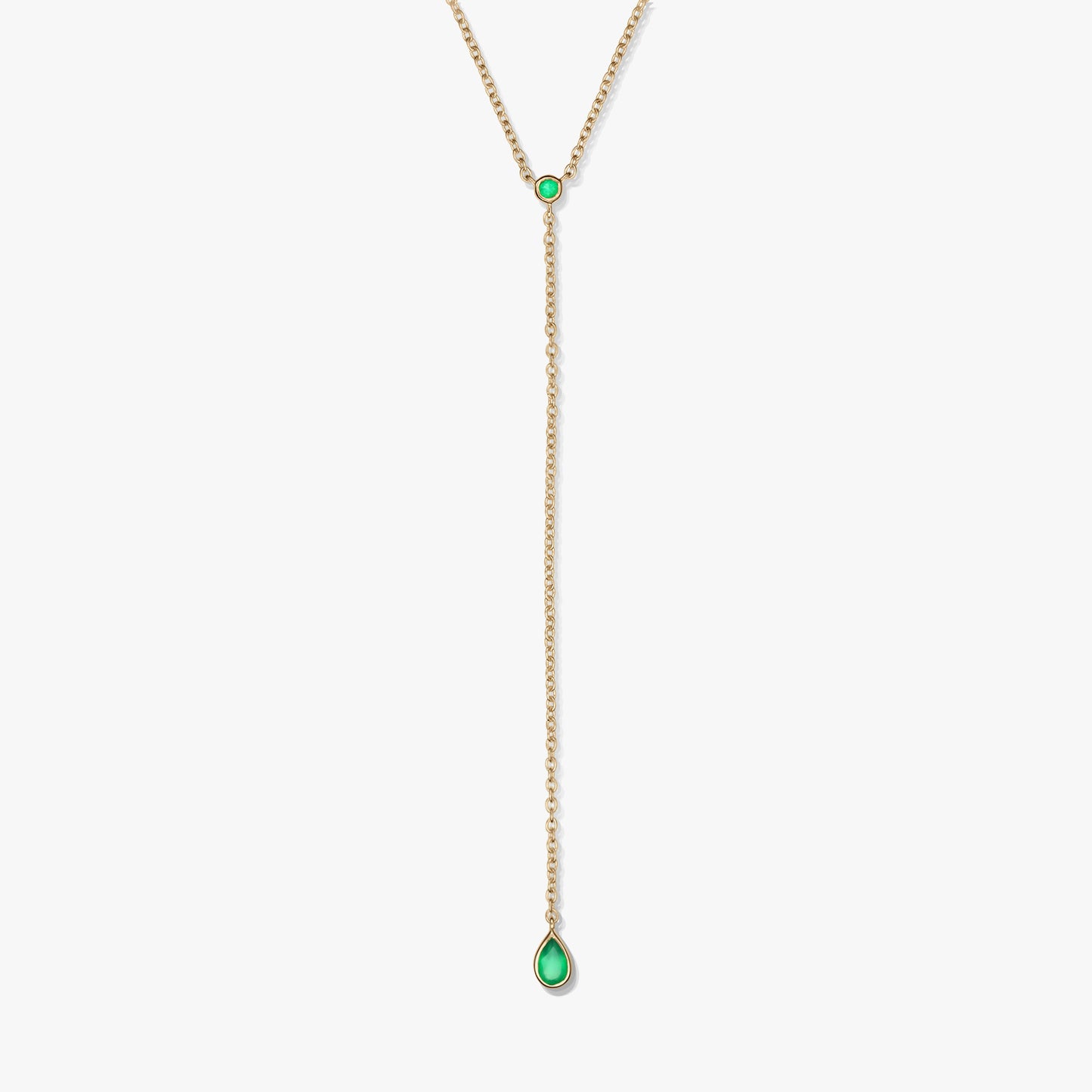 Gold-plated sterling silver lariat necklace with green onyx accents and a teardrop drop pendant, photographed on a white background.