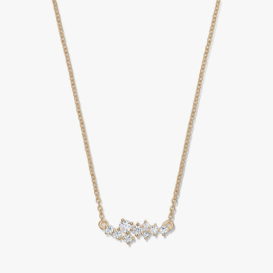 Golden Constellation silver necklace with a delicate chain and a starry cluster of clear stones, photographed on a white background.