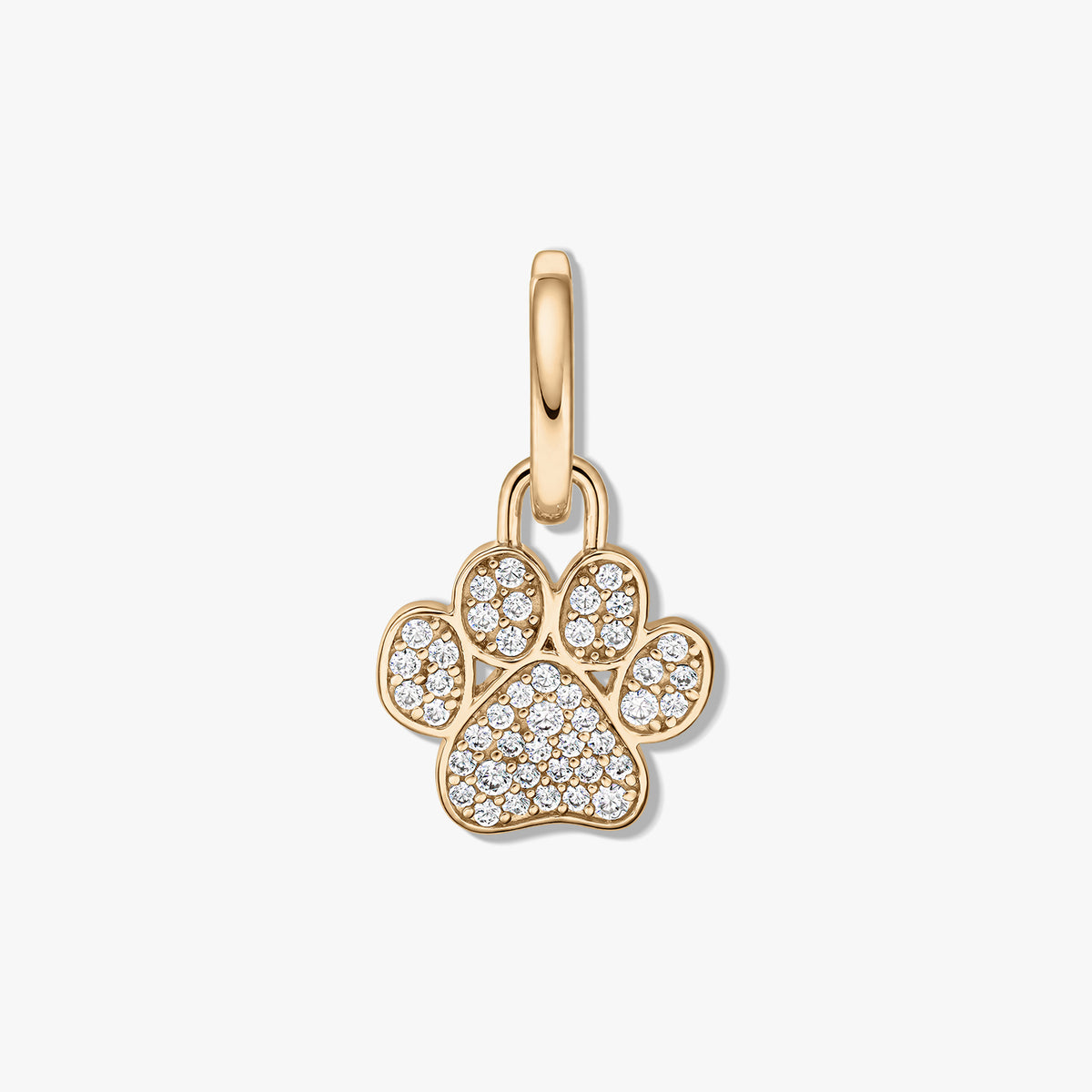 Sárga aranyozott sterling ezüst tappancs medál tiszta cirkónia pavéval, fehér háttéren.