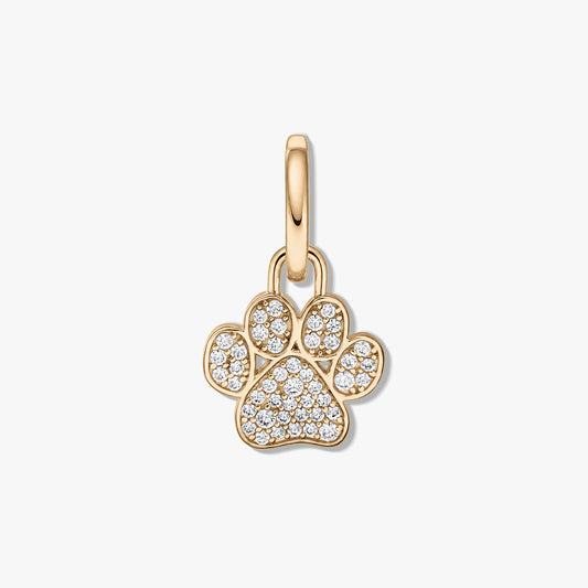 Yellow gold-plated sterling silver paw print pendant with clear zirconia pavé on a white background.