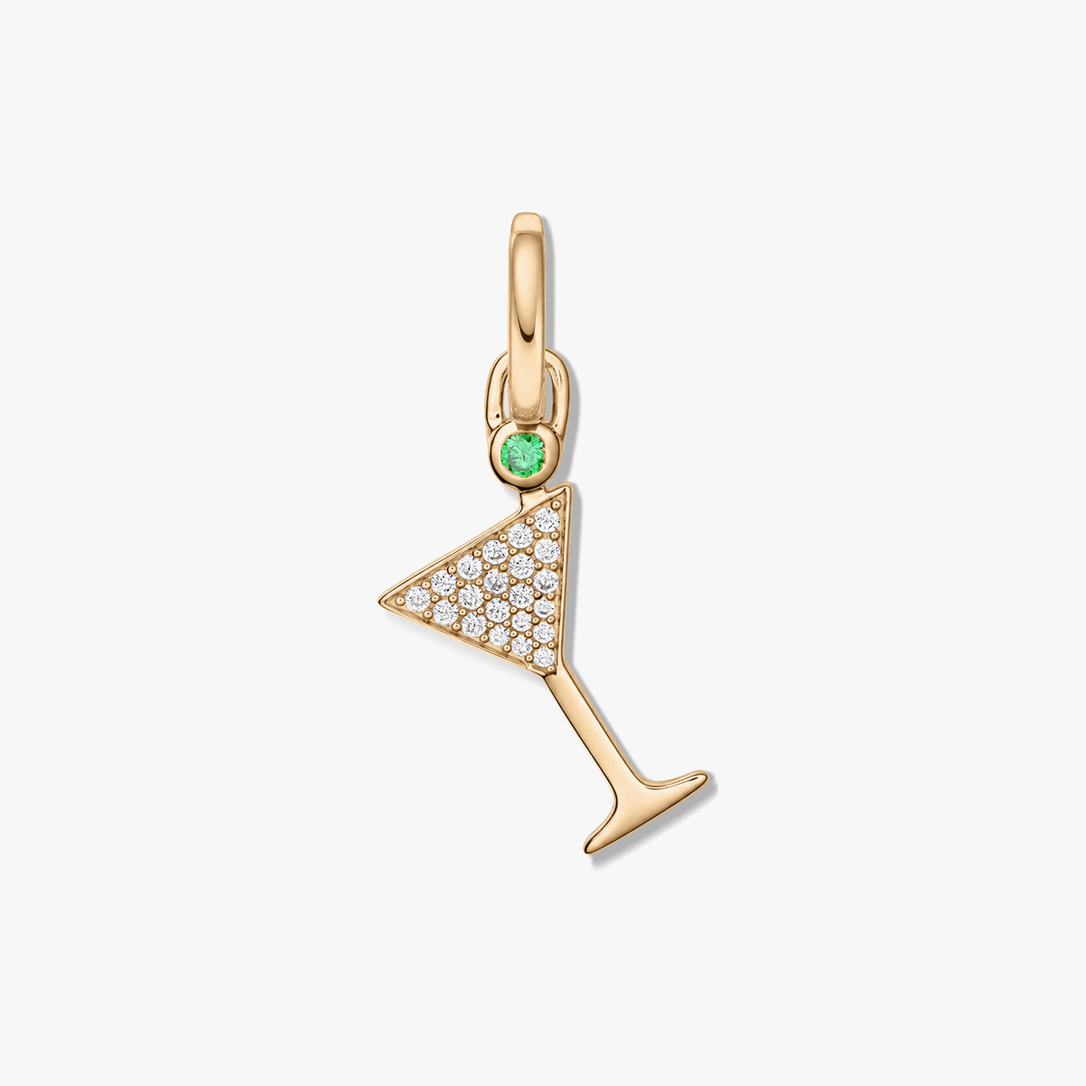 Gold-tone 925 sterling silver martini glass pendant with pavé clear zirconia and a small green stone, isolated on a white background.