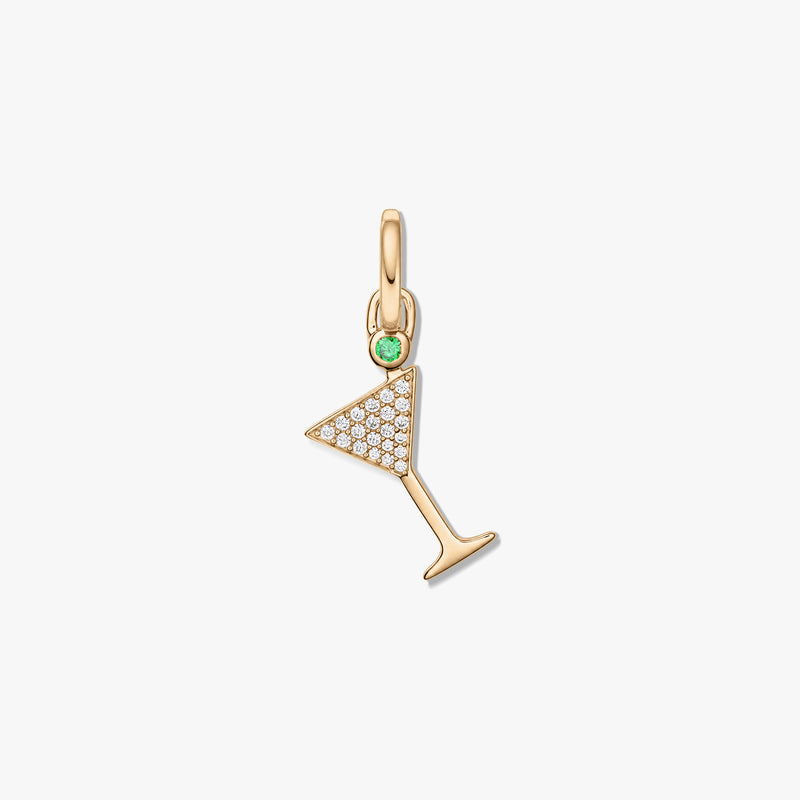 Gold-tone sterling silver pendant shaped like a martini glass with pavé clear zirconia and a small green stone accent on a white background.