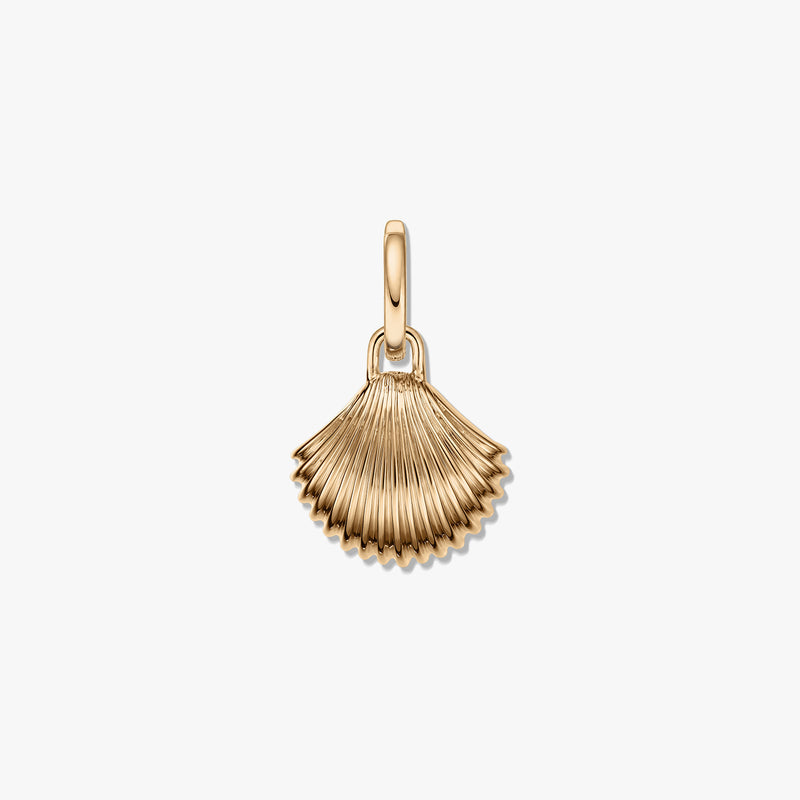 Golden shell silver pendant with a ridged fan shape and polished finish on a white background.