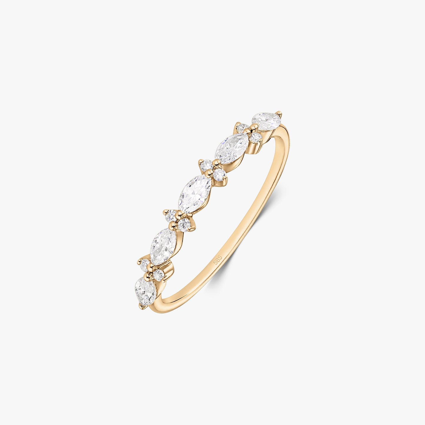 Aurora 14K yellow gold ring with alternating marquise and round natural diamonds on a slim band, isolated on a white background.
