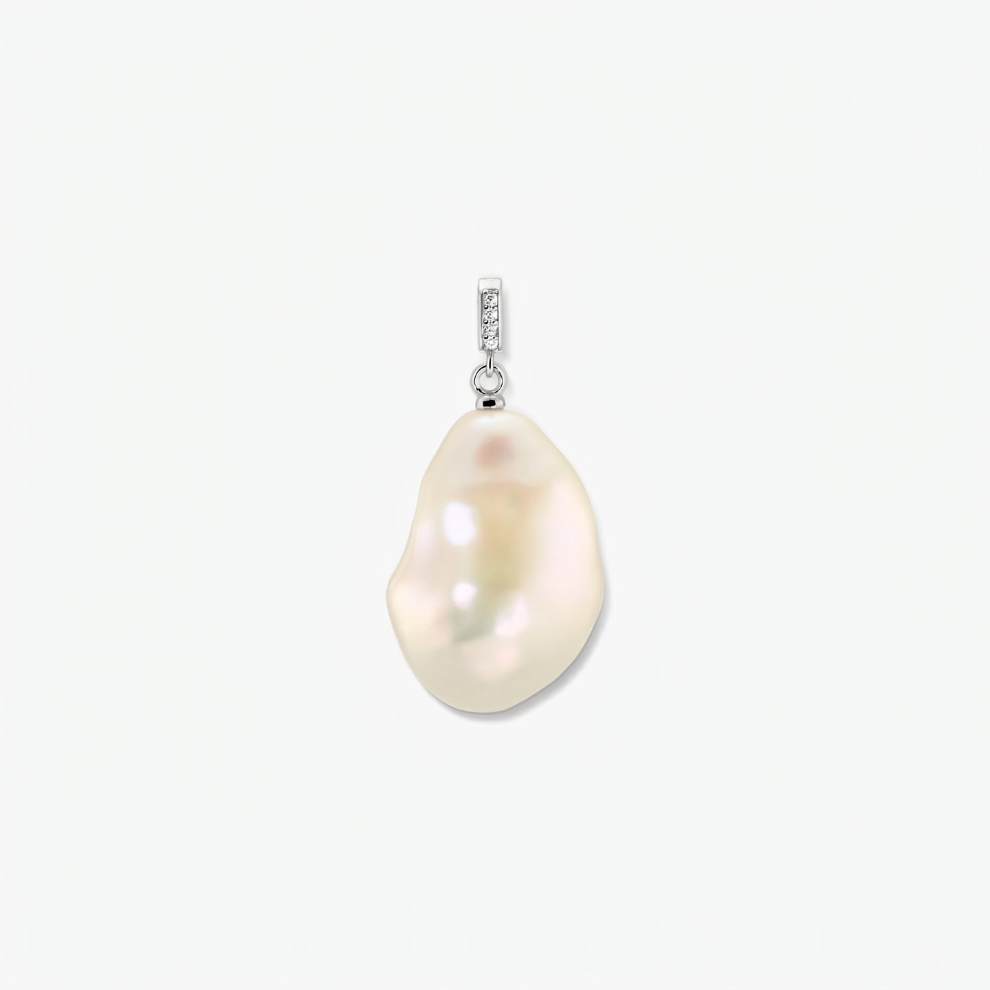 Rhodium-plated baroque pearl pendant with a zirconia-accented bail on a clean white background, centered.