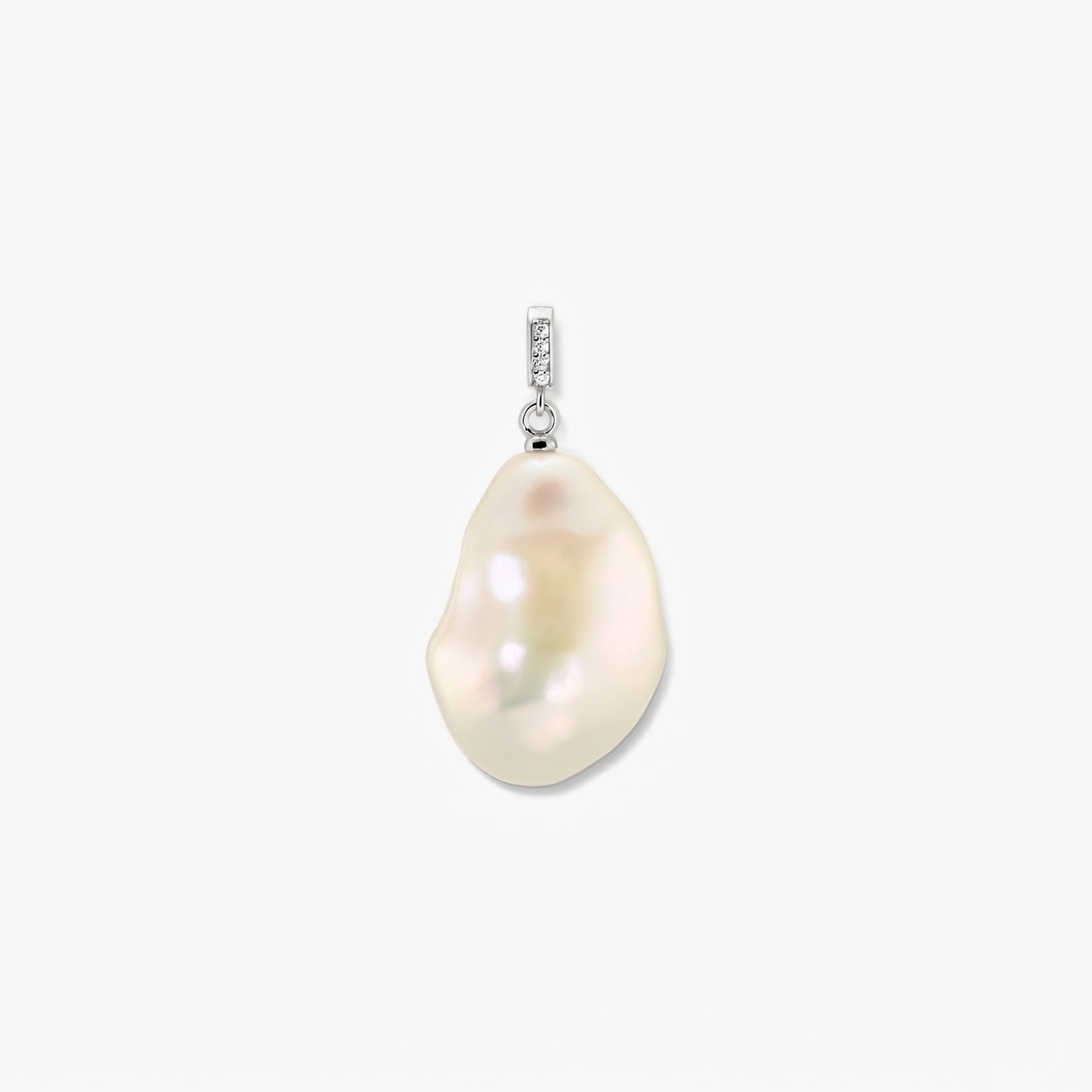 Rhodium-plated baroque pearl pendant with a zirconia-accented bail on a clean white background, centered.
