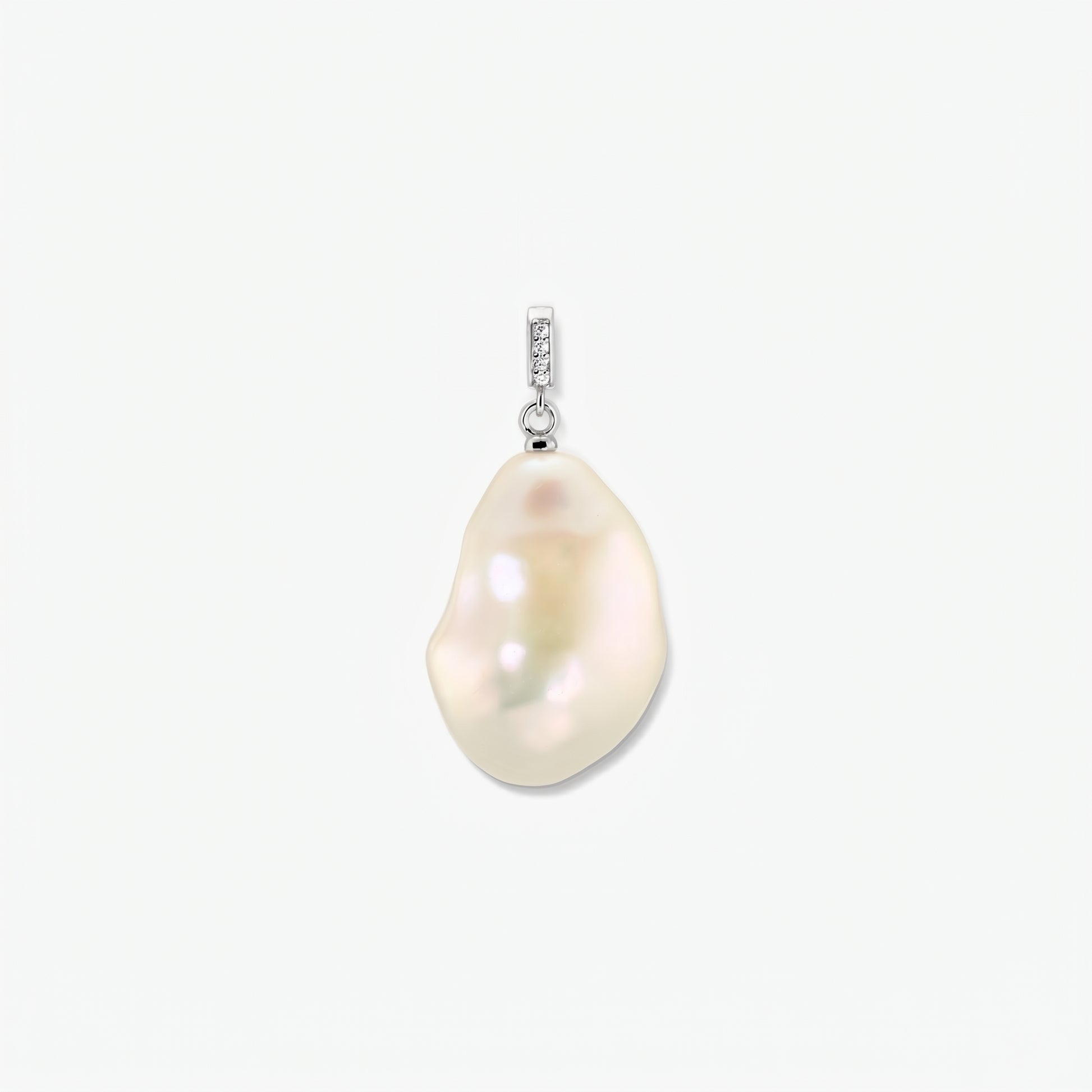 Rhodium-plated baroque pearl pendant with a zirconia-accented bail on a clean white background, centered.