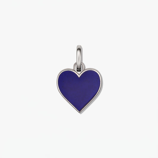 Silver heart-shaped pendant with a deep blue center, isolated on a white background.