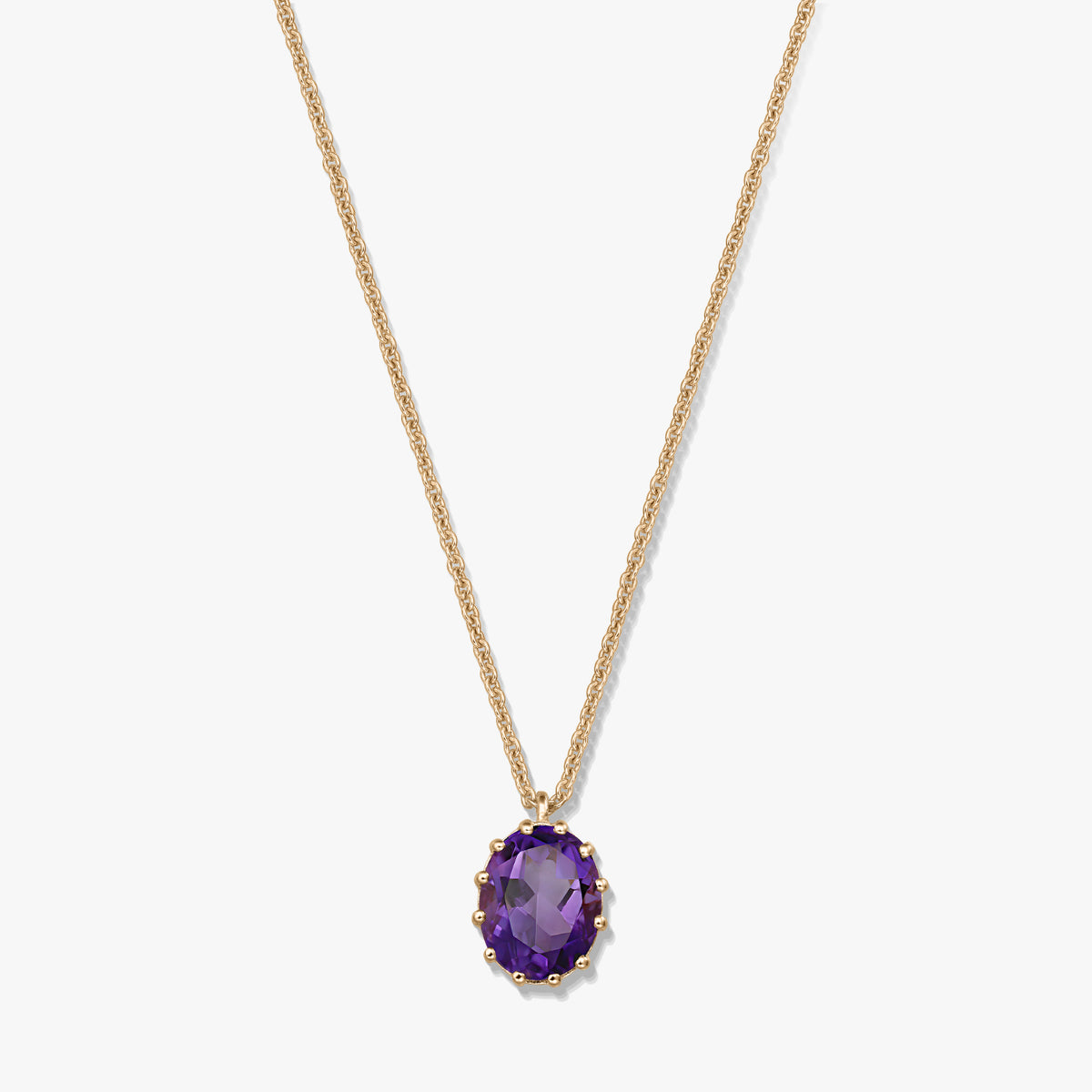 Gold-plated 925 silver necklace with an oval faceted amethyst pendant on a white background.