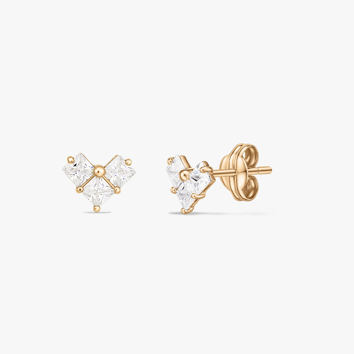 Pair of yellow gold stud earrings with three square clear stones forming a small heart-like cluster, shown on a white background.