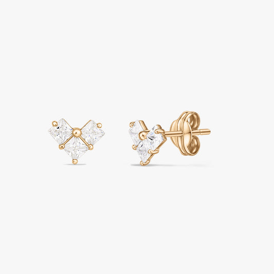 Pair of yellow gold stud earrings with three square clear stones forming a small heart-like cluster, shown on a white background.