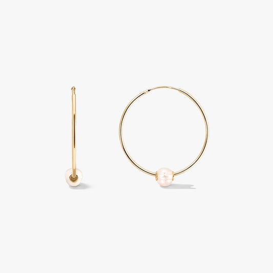 Golden Ines silver hoop earrings with cultured pearls, shown front and side on a white background.