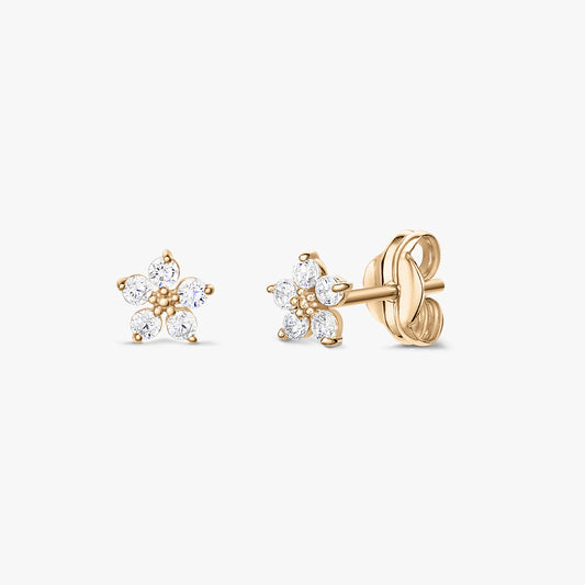 Pair of small gold floral stud earrings with clear zirconia stones, shown in front and side views with butterfly backs on a white background.