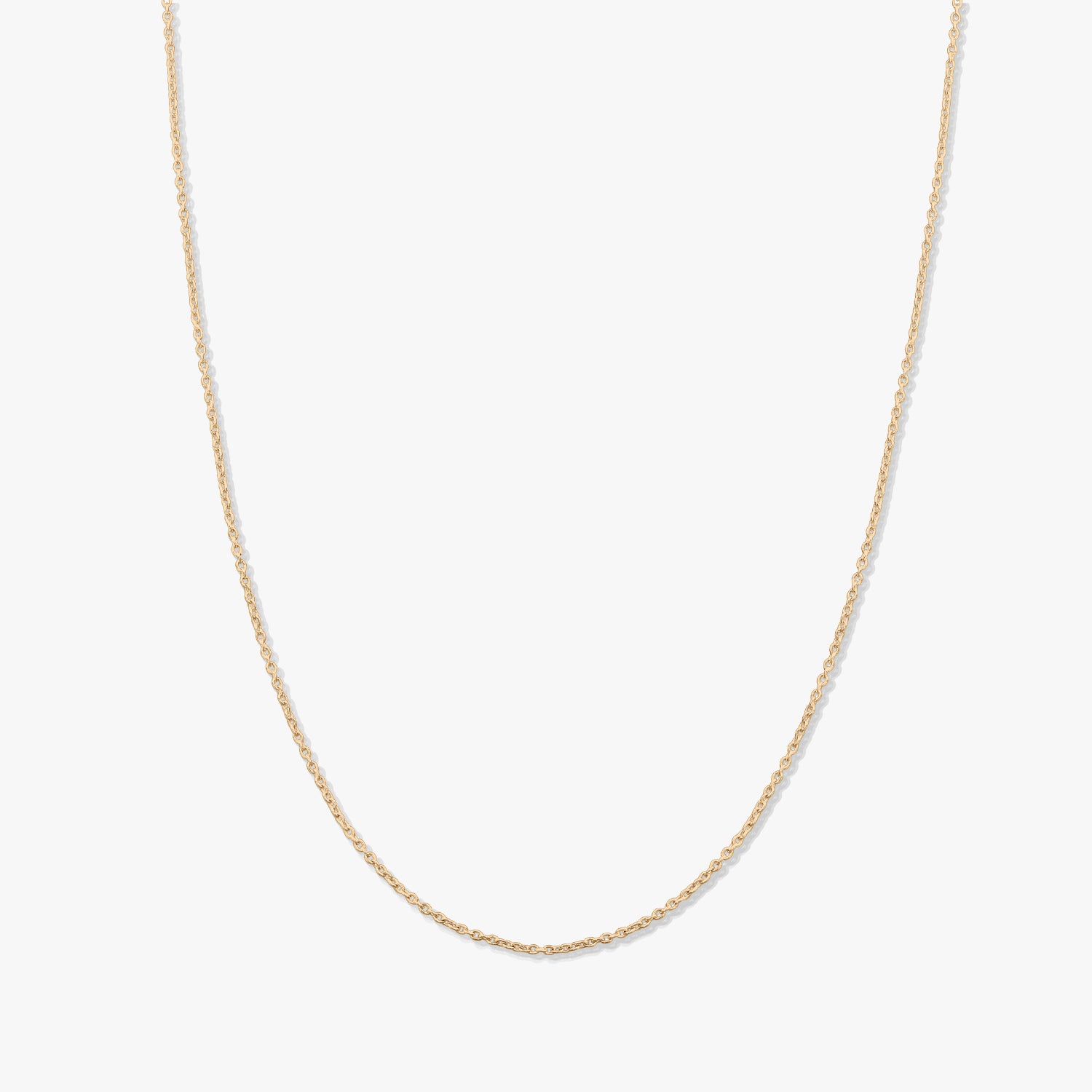 Minimalista 14K sárga arany lánc típusú nyaklánc egyszínű fehér háttéren.