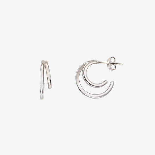 Siamese Silver Earrings by Indira — double‑hoop sterling silver stud earrings with butterfly backs on a white background.