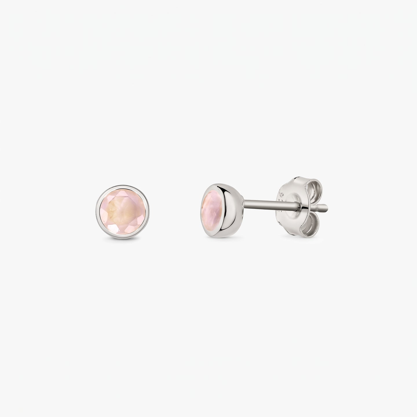 Pair of 925 sterling silver stud earrings with round faceted rose quartz stones on a white background, shown front and side with butterfly backs.