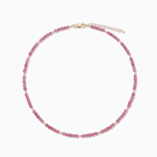 Silver Necklace Golden SummerScape - Tourmaline by Indira: pink tourmaline beaded necklace with small gold accents and a lobster clasp with extender, on a white background.