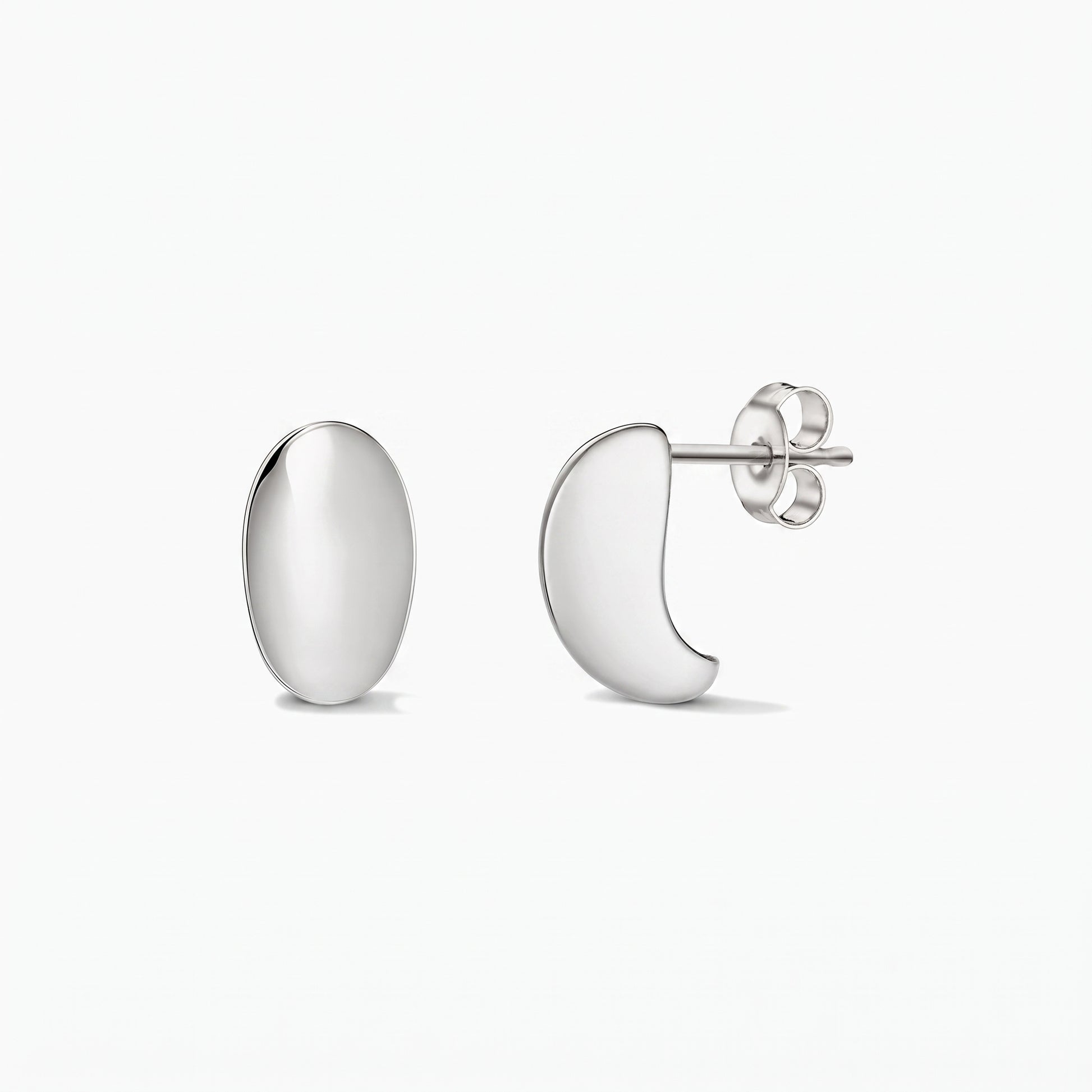 Pair of polished silver Half Dome stud earrings on a white background, shown in front and side views with butterfly backs.