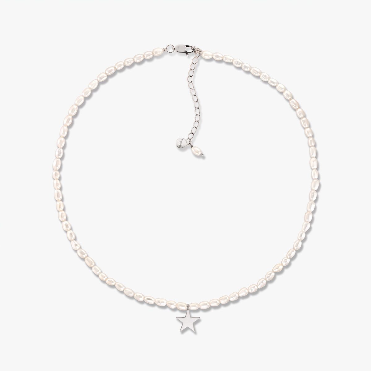 Tiana sterling silver necklace with cultured pearls and a small star pendant, shown on a white background with adjustable extender chain.