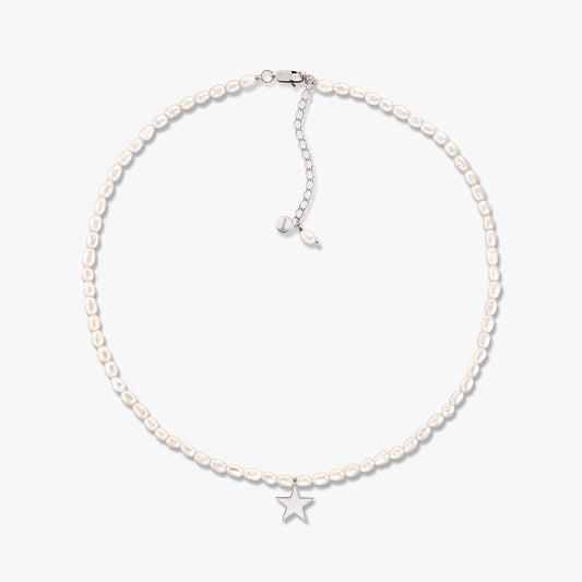 Tiana sterling silver necklace with cultured pearls and a small star pendant, shown on a white background with adjustable extender chain.